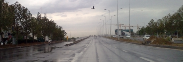 Only reason to include this picture is the flying bird caught in it, Jinnah Avenue