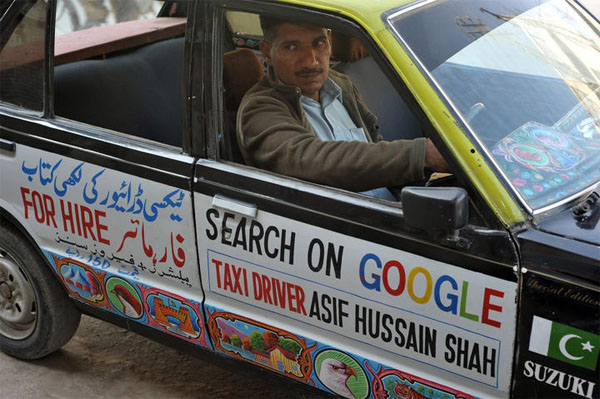 Asif hussain Shah the book writer in his taxi
