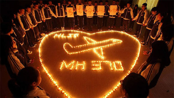 Candle lit love message for MH370 Passengers and Crew with Heart Sign
