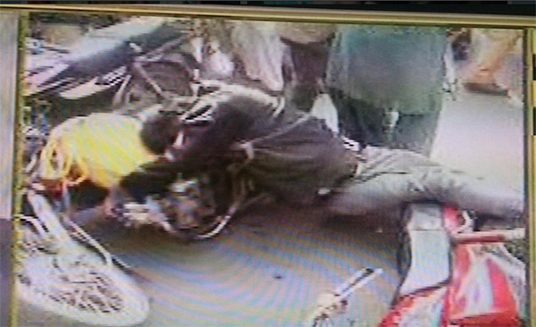 a visually impaired person unconcious on the ground