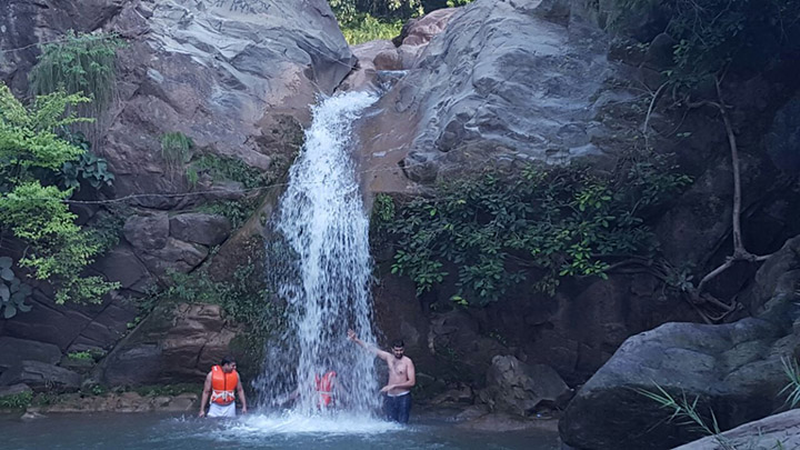 People Under Neela Sandh Water Fall