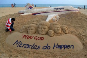 A sand model with message for MH370 passengers and crew